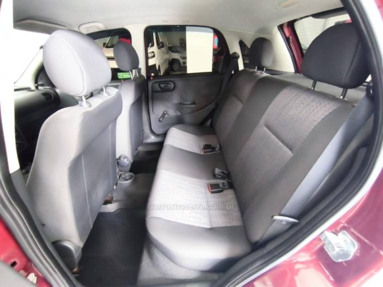 CHEVROLET - CORSA - 2010/2011 - Vinho - R$ 39.900,00