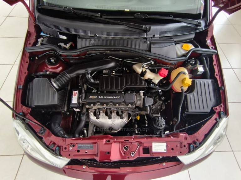 CHEVROLET - CORSA - 2010/2011 - Vinho - R$ 39.900,00