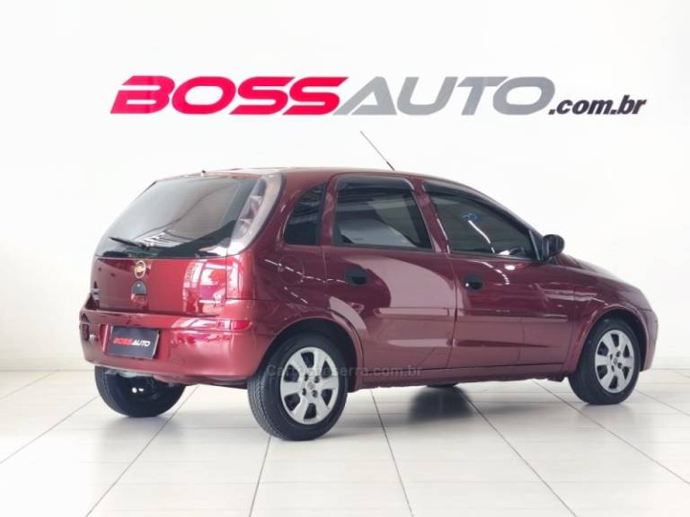 CHEVROLET - CORSA - 2010/2011 - Vinho - R$ 39.900,00